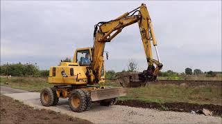 KOMATSU PW-110 wheel excavator