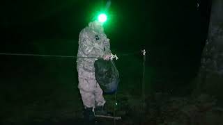 packing the tarp away. failed set up in a storm Dartmoor 8th Dec 2024