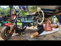 Genius girl completes a three-wheeled vehicle with a motorbike engine for herself