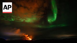 Lava and northern lights: Eruptions slowing from volcano in Iceland