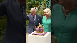 King Charles and Queen Camilla Celebrate Coronation by Cutting Crown Cake 👑🎂