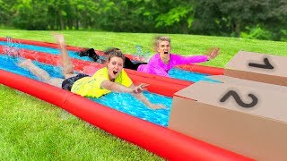 TRY NOT TO SLIP N SLIDE INTO THE WRONG MYSTERY BOX!! (Backyard Waterslide Challenge)