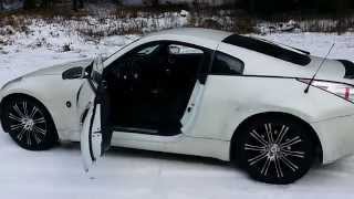 Nissan 350z stuck in snow? Use stones