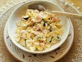 Creamy farfalle (bow-tie) pasta with smoked salmon and zucchini.