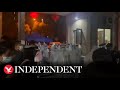 Looting and unrest in Shanghai as city plunged into strict Covid lockdown