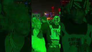 A$AP Rocky and Rihanna enjoying Tyler, The Creator's performance at Coachella