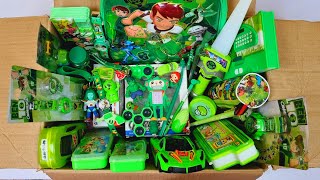 Box full of green stationery - rc plane, ben10 bag, projector watch, calculator pencil box, erasers
