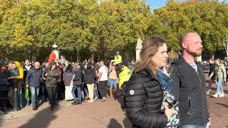 Tourists gathered outside Buckingham Palace to watch changing of the guard.