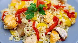 Salmon with rice and vegetables in the oven. Delicious dinner!