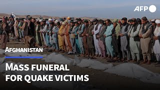Mass funeral for Afghan quake victims as families still missing | AFP
