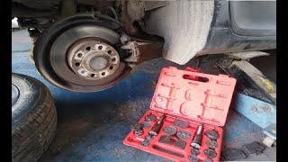 تغيير تيل الفرامل الخلفيه للسيارات الالمانيه والكوريه_rear brake caliper with handbrake