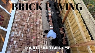 Paving a courtyard with recycled bricks