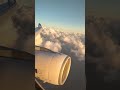 airbus a 330 overflying clouds descent to and landing in paris charles de gaulle