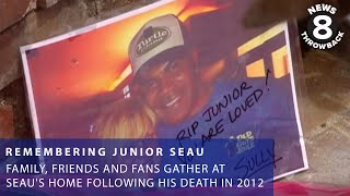 Family, friends and fans gather at Junior Seau's home following his death in 2012