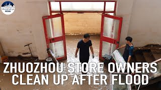 Businesses picking up pieces after floods ravage Northern China city of Zhuozhou