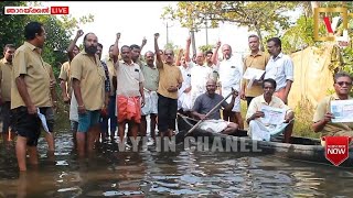 വേലിയേറ്റം മൂലം ഇടറോഡുകൾ വെള്ളത്തിൽ. വഞ്ചിയുമായി ഓട്ടോ തൊഴിലാളികളുടെ പ്രതിഷേധം