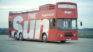 Pole vaulter leaps into moving Sun bus