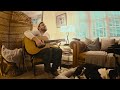 chas leman with cyril the bulldog smoking again acoustic living room