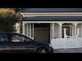 house with amazing secret garage hidden behind traditional front stuff.co.nz