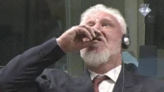 Suspect claims he drank poison at a UN appeals hearing