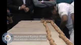 Guinness world record most walnuts cracked against the head in one minute