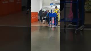 Walmart doorman checking black customers people receipts and not white customers