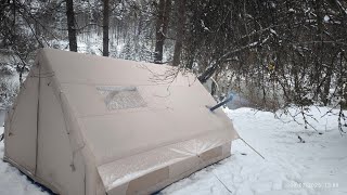 Our snow camp with our inflatable tent in a place like the land of snow.