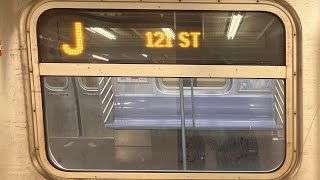 On board a 121 Street bound R160 J train from Broad Street to 121 Street.