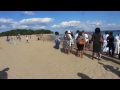 singing in preparation for baptism at orchard beach. bronx ny