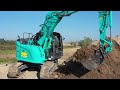 Kobelco SK140SRLC-7 Thriving at a Hydraulic Plant in Northern Italy