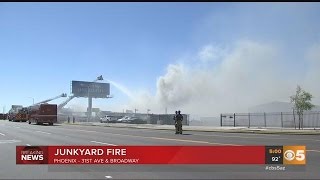 A firefighter suffers from heat exhaustion battling a fire in Phoenix