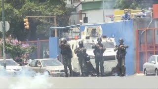 Venezuelan police fire tear gas at anti-Maduro protesters