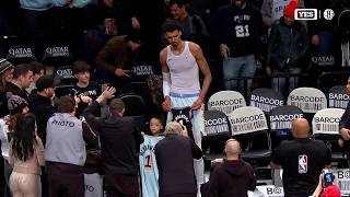 Victor Wembanyama does jersey swap with young fan after win vs. Nets | NBA on ESPN