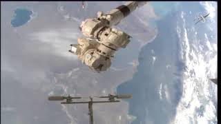 Spacewalker on robotic arm has amazing Caspian Sea view