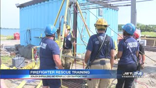 City of Erie Firefighters practice confined space rescue training