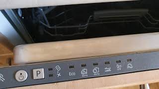 Adjusting the salt and rinse aid levels on a hotpoint dishwasher.