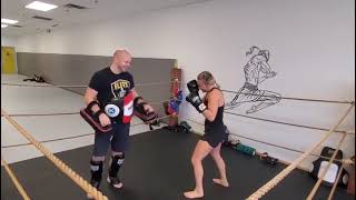 Canadian Female Muay Thai talent Stephanie Schmale getting some padwork in with Kieran Keddle.