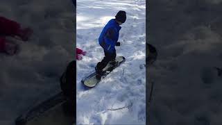 Me snowboarding for the first time at my dad's house