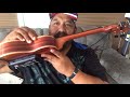 kawika kahiapo on his custom koaloha tenor black label series ukulele using tonewood amp