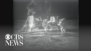 Apollo 11 astronauts plant flag on the moon on July 20, 1969