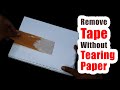 How to remove tape without tearing paper