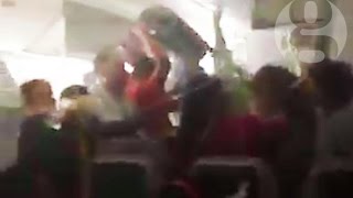 Dubai plane crash: chaotic scenes inside plane after crash-landing at Dubai airport