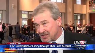 Former Commissioner Facing Charges Over Fake Account