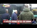 otobüs önünde heykel gibi durdu