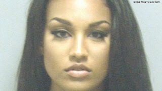 Angela Coates' glamorous mugshot goes viral