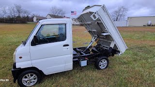 1999 Mitsubishi MiniCab Dump Truck.  AC, HEATER,  4X4, HI-LO, POWER STEERING.