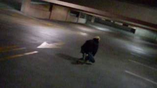 Night Carvers Russell and Greg skate a garage on Longboards.