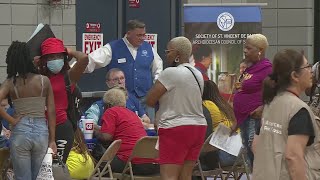 Hundreds pack as flood aid center in Florissant closes early due to storms