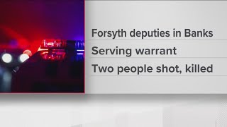 Two people shot, killed during warrant service