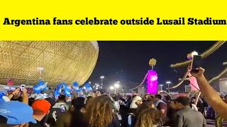 Argentina fans celebrate outside Lusail Stadium after Argentina's  victory over the Netherlands